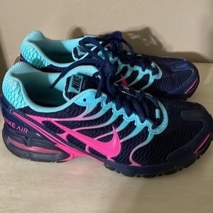 Nike Air Max Torch 4 running shoes.